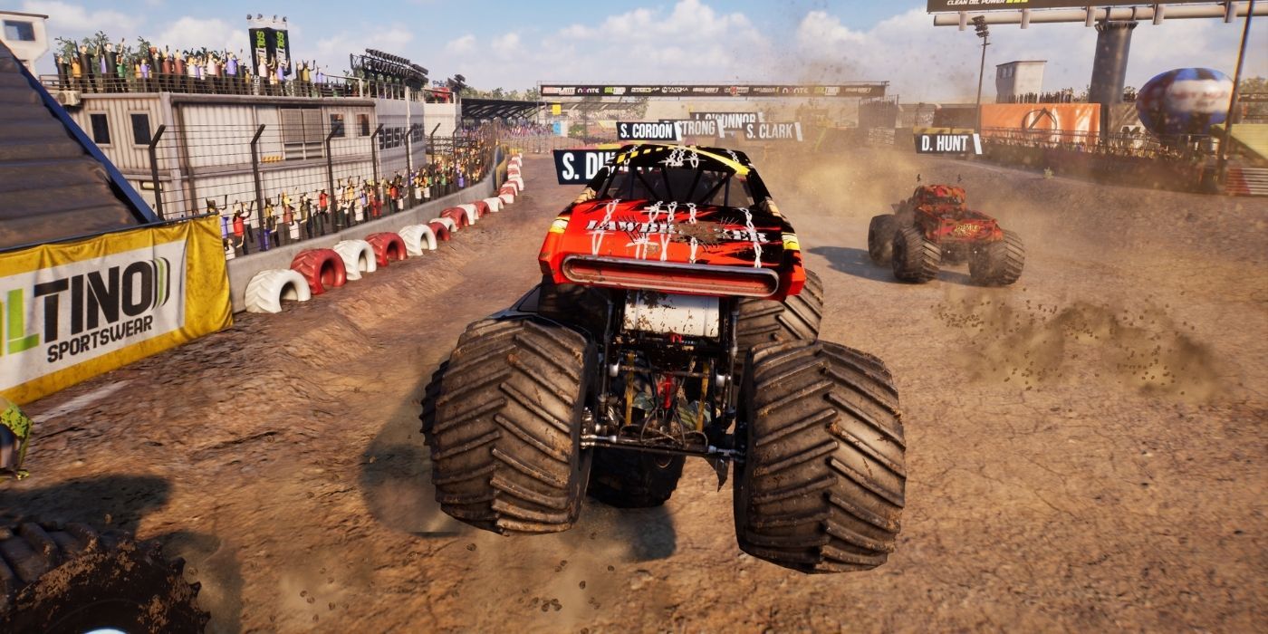 red monster truck with big wheels racing