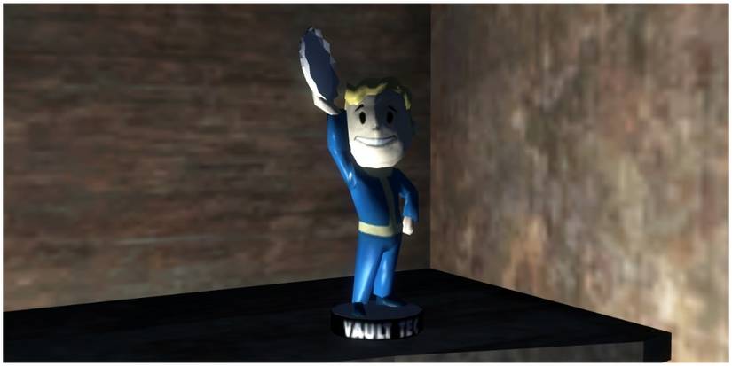 The barter bobblehead holding up a cap