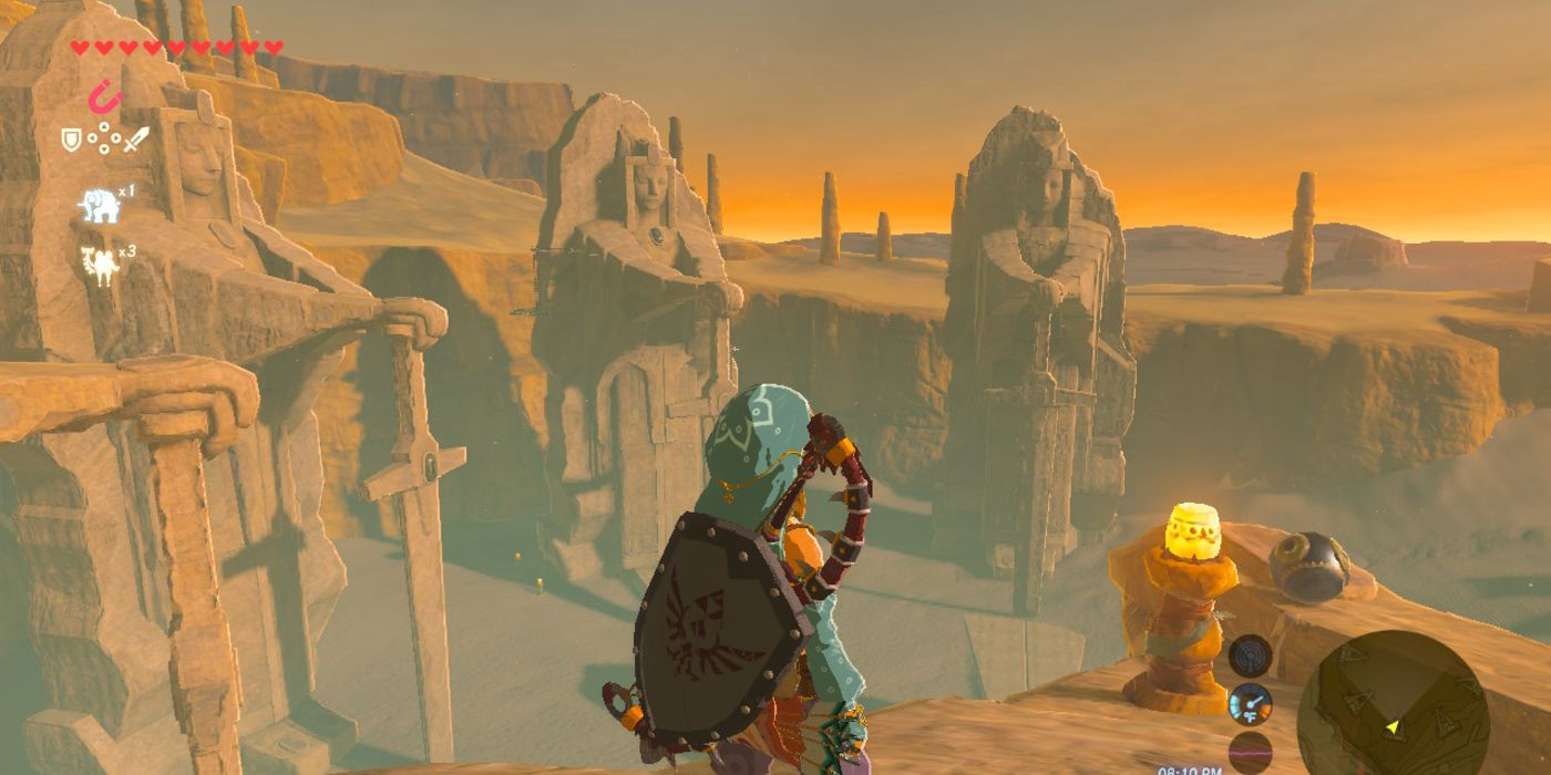 Legend of Zelda Breath of the Wild Large Statues of Women Holding Swords in the Desert