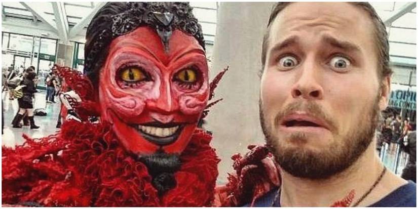 A HIM with a carnival mask and a friend