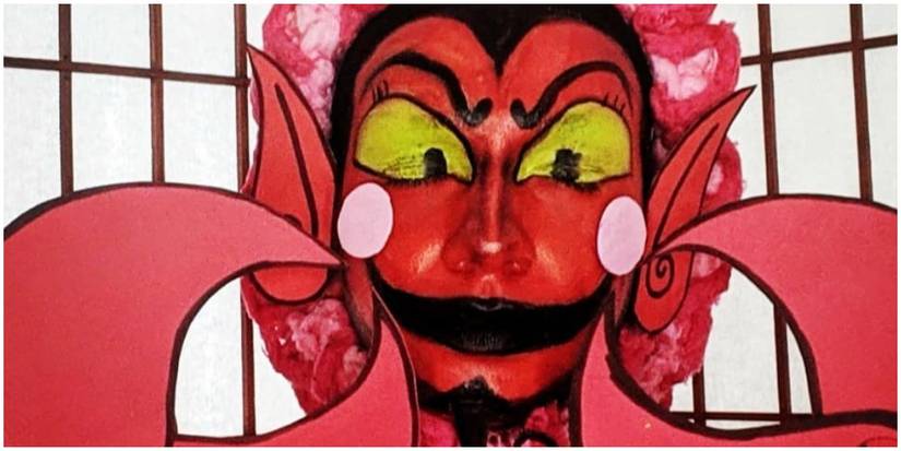 A closeup of the HIM cosplay with bodypaint