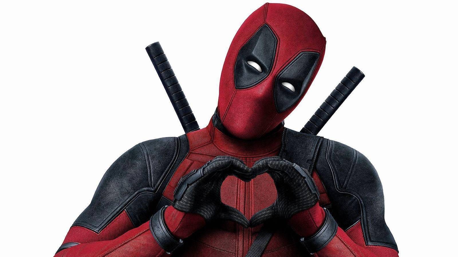 Deadpool making a heart shape with his hands