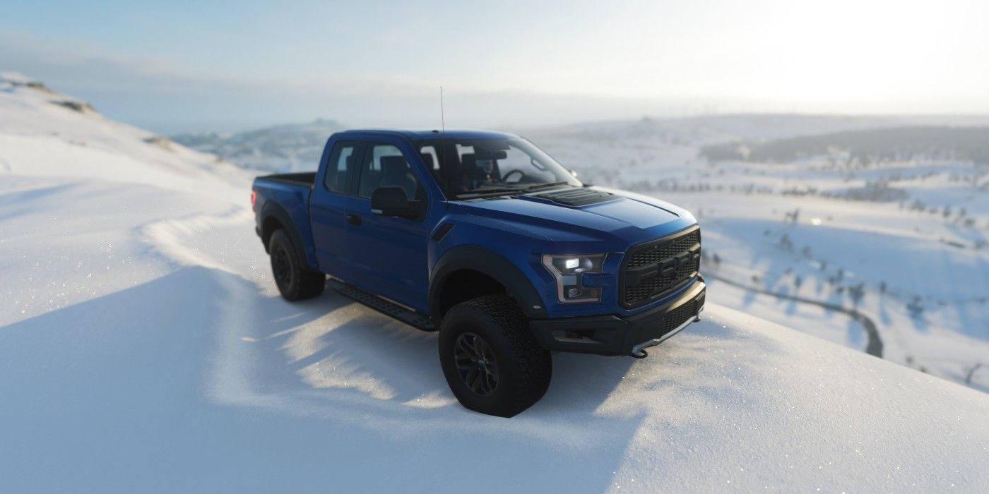 Forza Horizon 4 Ford F-150 Raptor driving through snow with scenery