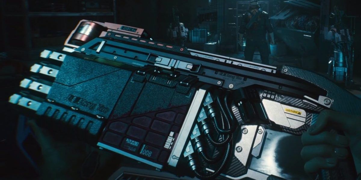 First person V looking at L-69 Zhuo shotgun in Cyberpunk 2077