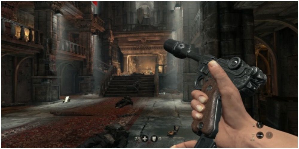 The player reloading a pistol