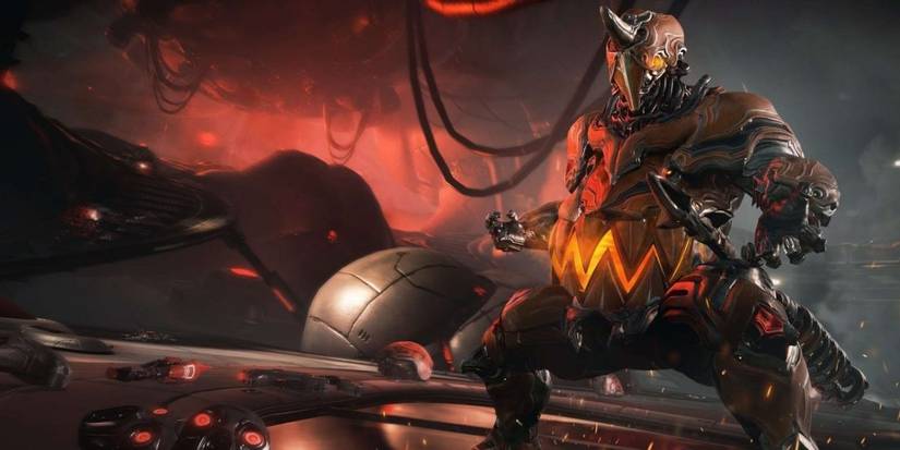 Warframe Grendel Poses in front of fire