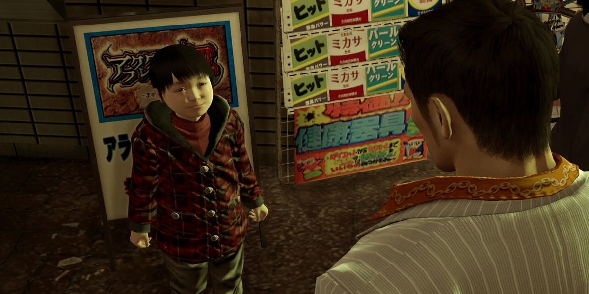 Yakuza 0 - Kiryu talking to a child