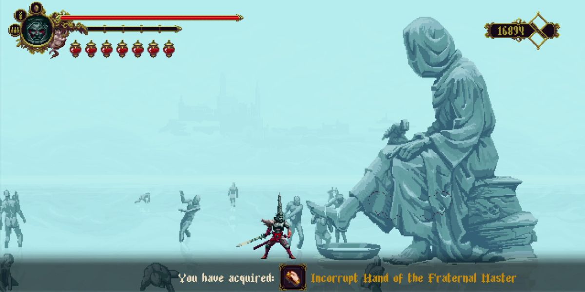 player getting a relic from the big statue in the lake of silent pilgrims.