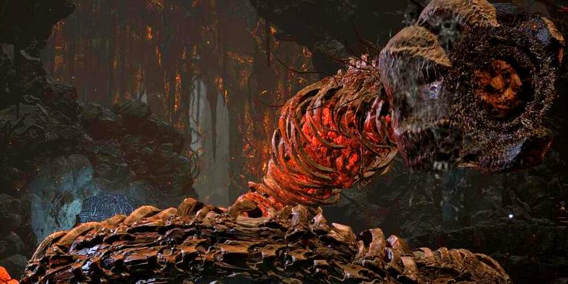 miniboss and unique sand worm enemy in the smouldering lake.