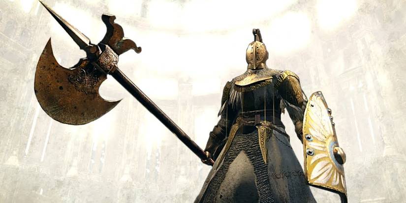 player holding a golden greataxe in front of a light background.
