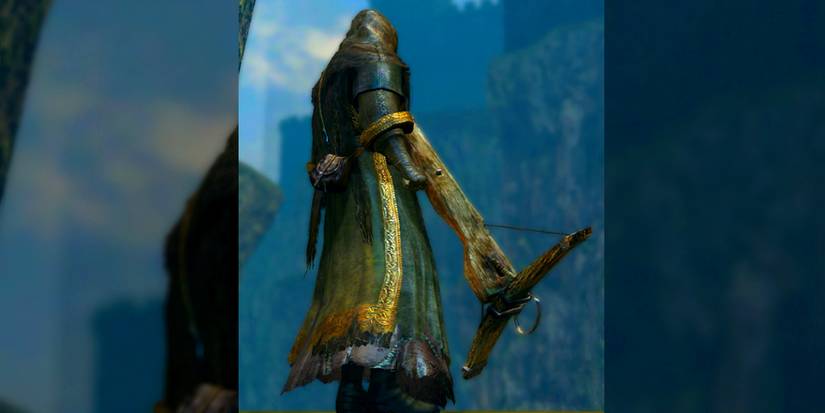 shot of player holding a heavy crossbow from behind.