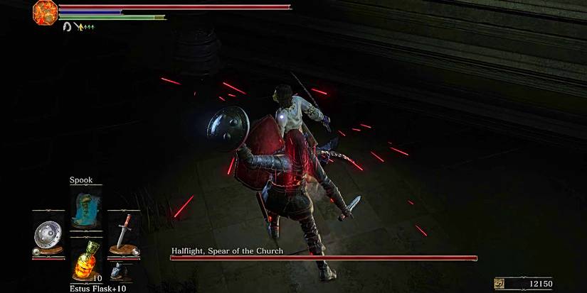 player parrying a boss with a small shield.