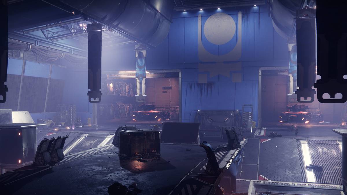 vehicle bay containing two tanks inside a giant tank