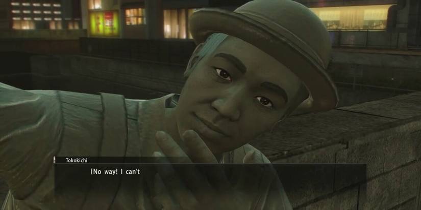 Yakuza 0 - Man dressed as a statue talking