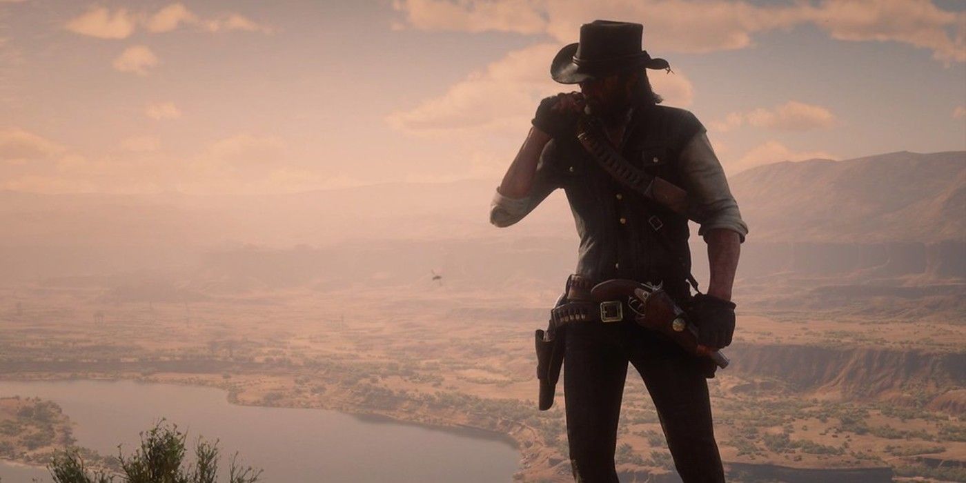 John Marston poses with the sunset in background red dead 2