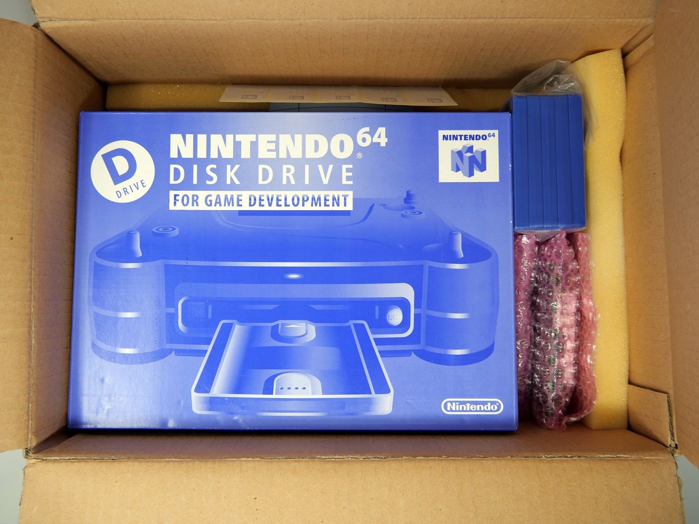 Open box showing a rare Nintendo 64 development kit inside which is in mint condition.