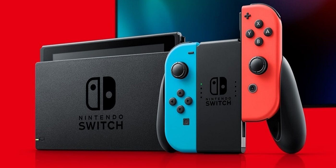 Фотография консоли Nintendo Switch с синими и красными джойконами.
