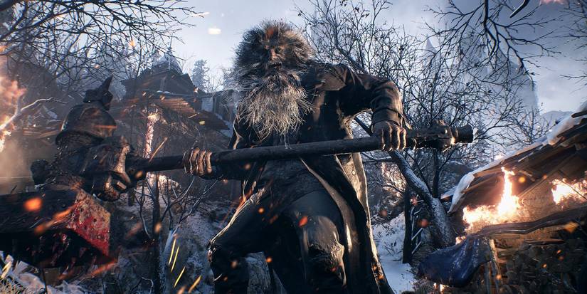 Screenshot from Resident Evil Village showing a werewolf creature holding a sledgehammer