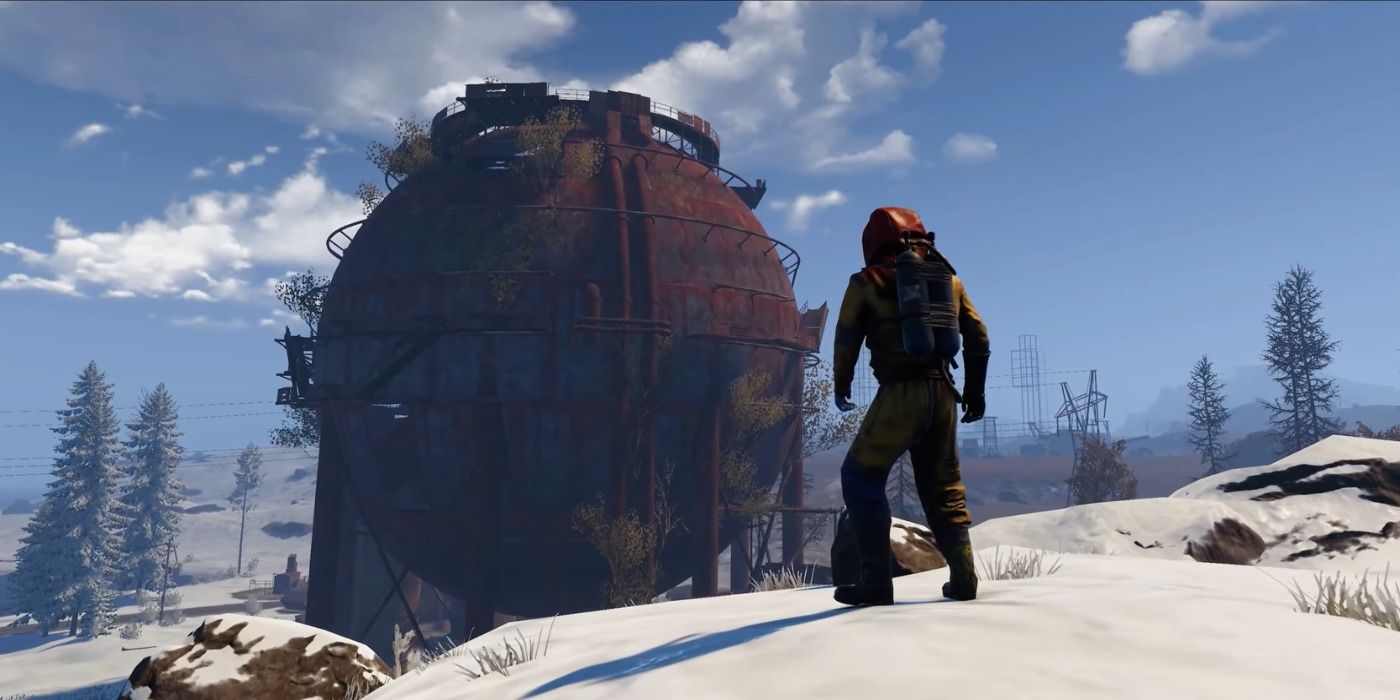 rusts console version beta player standing in front of water tower