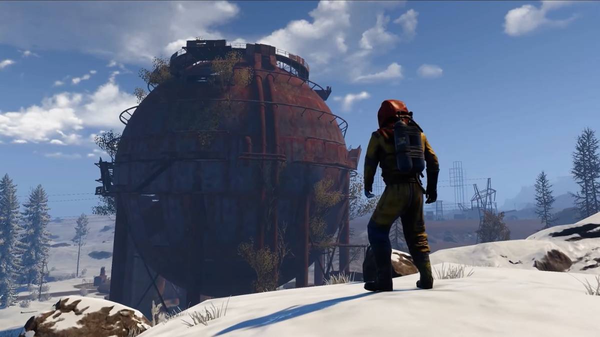 rusts console version beta player standing in front of water tower