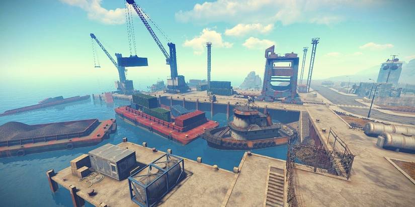 rust overhead view of harbor with tugboat and barges