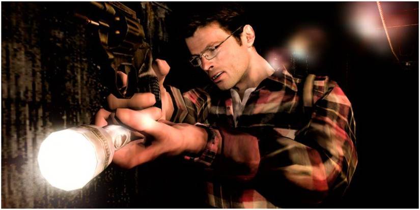 Man with glasses holding a gun