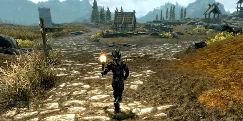 Player sprinting down a road in Skyrim