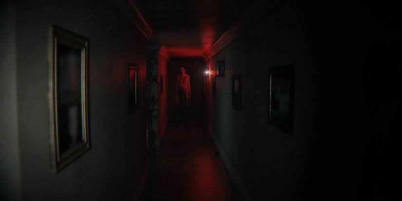 Screenshot showing Lisa in a red corridor in P.T.