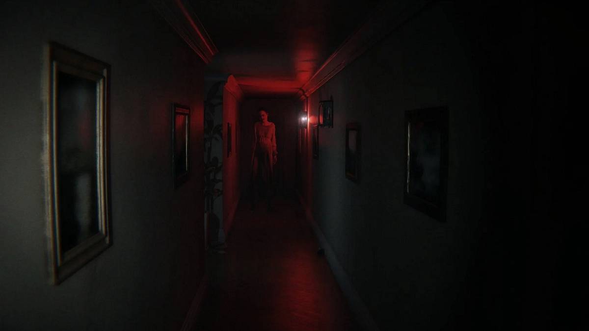 Screenshot showing Lisa in a red corridor in P.T.