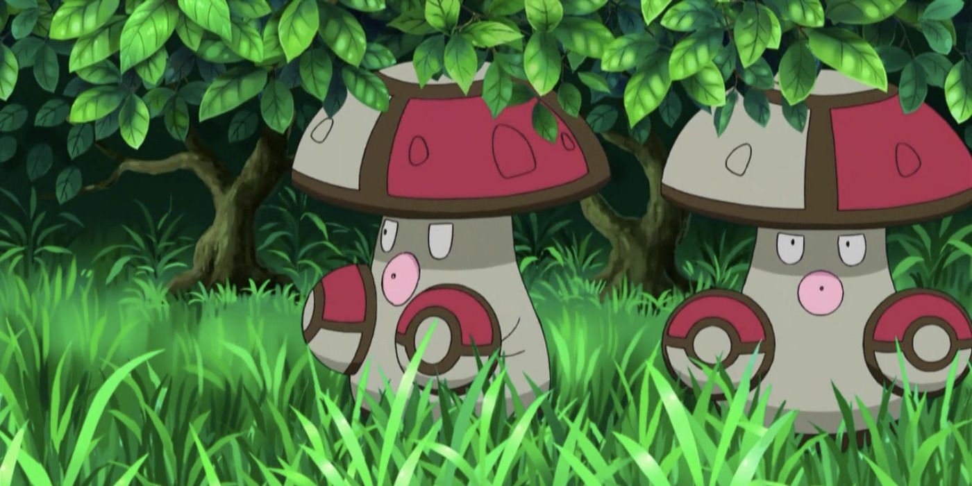 Two Amoonguss Pokemon in the shrubs in anime