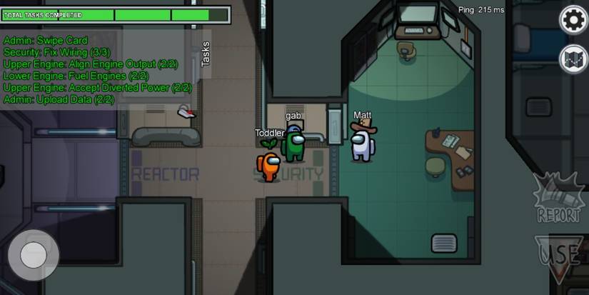 A group of three crewmates hanging out near security in Among Us