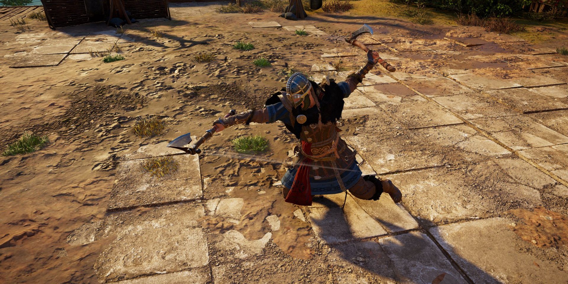 eivor swinging a bearded axe in each hand in a light attack combo.