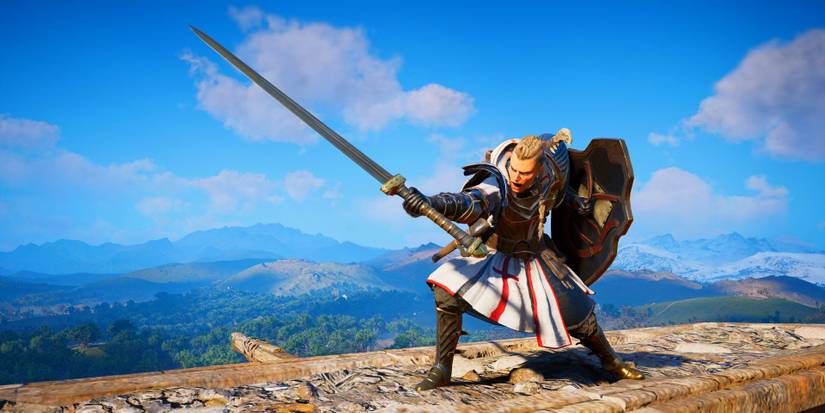 eivor using a great sword and a heavy shield.