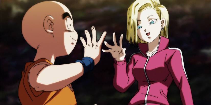 Krillin and Android 18 congratulate each other for their victory in Dragon Ball Super