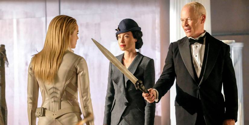 Legends of Tomorrow Damien Darhk points a sword at Sara Lance