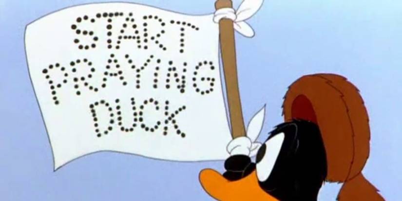 My Favorite Duck (1952), Daffy holding a sign that says "start praying duck"