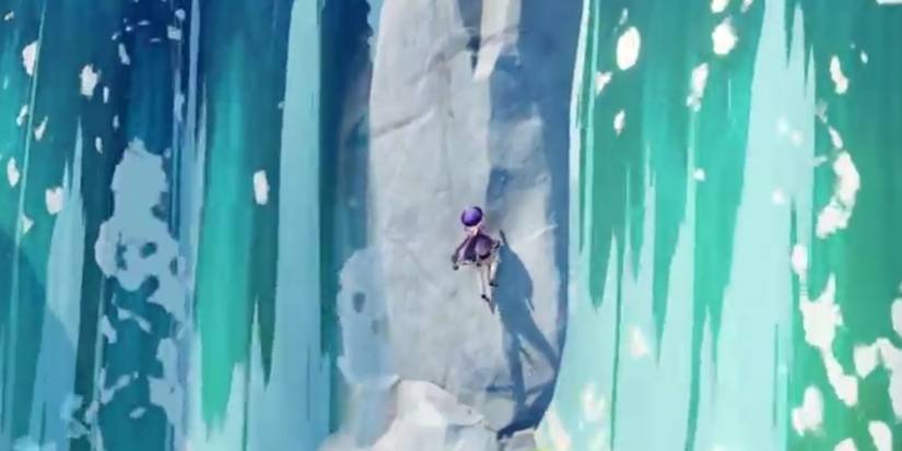 Qiqi climbing a cliff