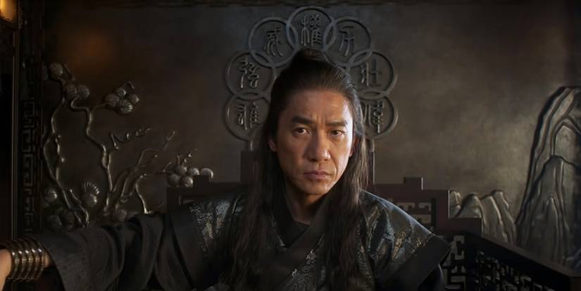 Mandarin sits on his chair in Shang-Chi