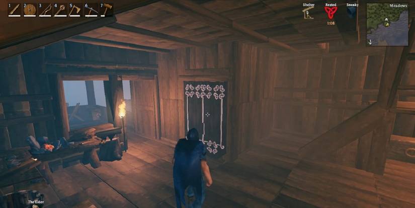Valheim banners hanging over secret room entrance