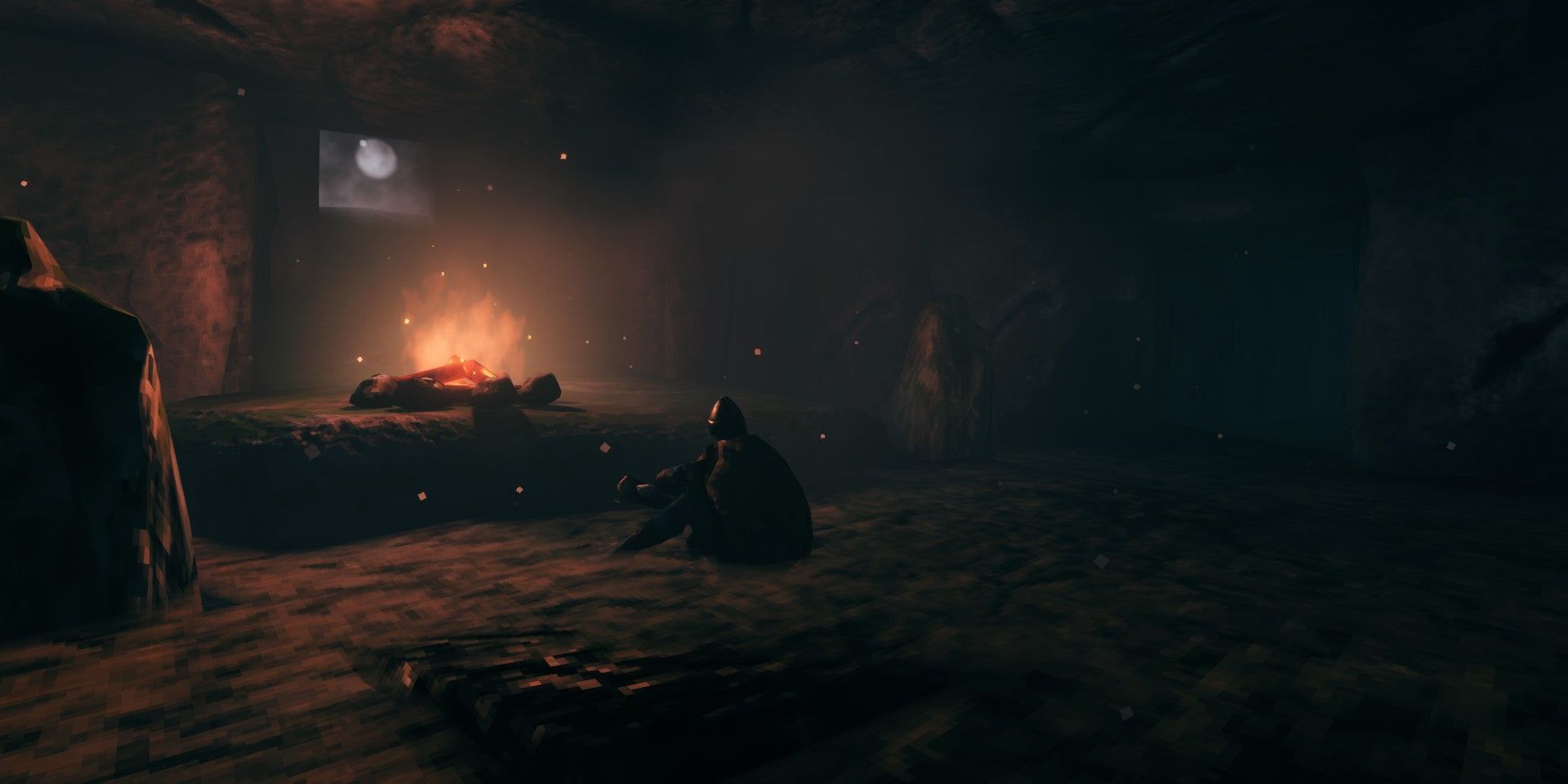 A campfire in a Valheim dungeon with a player sitting at it.