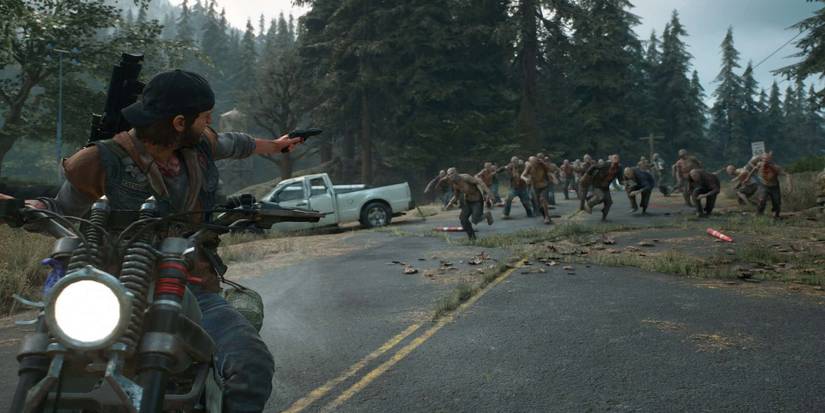 deacon shooting at horde from motorcycle