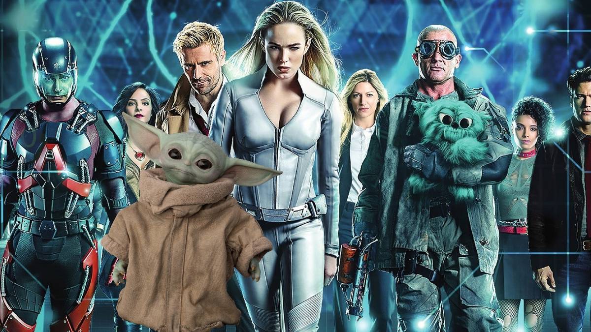The cast of DC's Legends of Tomorrow with Grogu/Baby Yoda from The Mandalorian