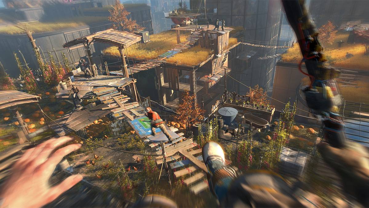A Dying Light 2 player leaps at an enemy holding a machete in their right hand