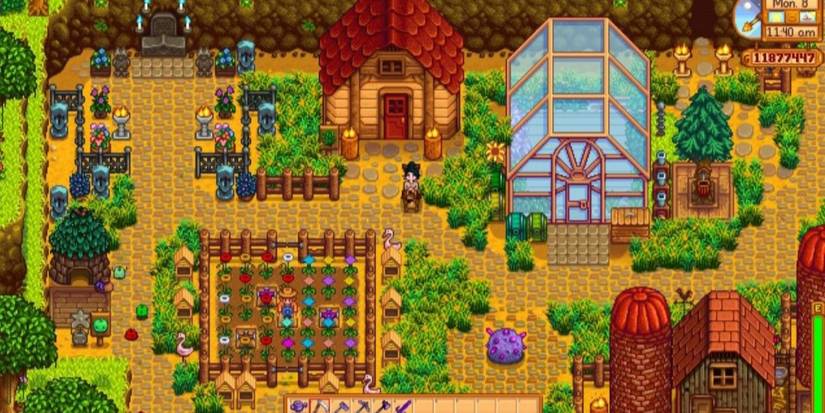 stardew valley farm with flower pen, grass, shack and greenhouse