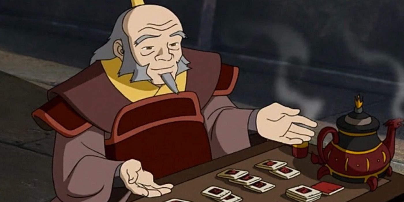 iroh playing game and drinking tea