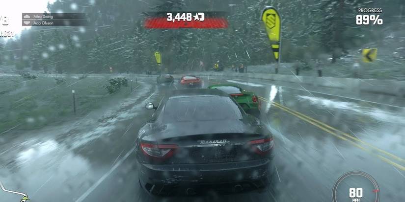 Cars on the road in heavy rain.