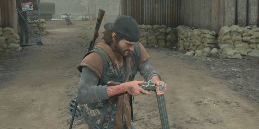 deacon reloading a shotgun