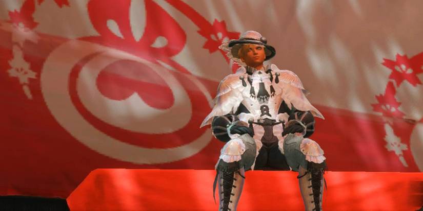 hunter sitting down in kamura with pigmented jelly armor