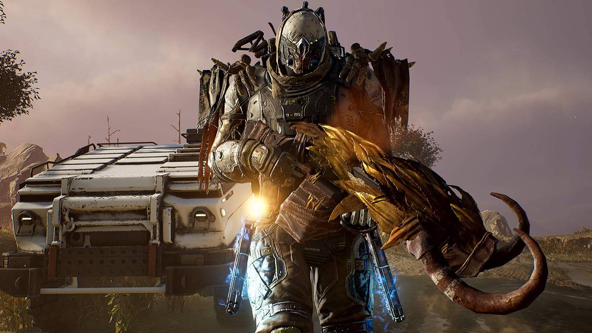 outrider standing in front of convoy vehicle