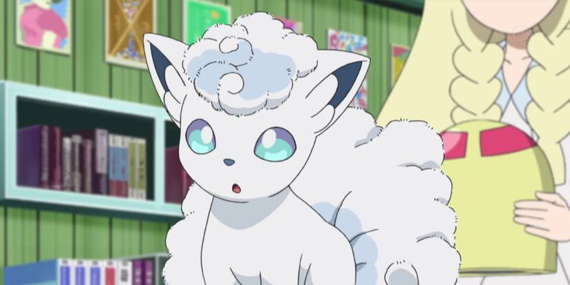pokemon alolan vulpix in room with lots of books
